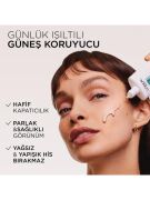 L'Oreal Paris Bright Reveal Spf 50+ Koyu Leke Karşıtı Renkli Fluid Günlük Yüz Güneş Kremi 50ml - Light